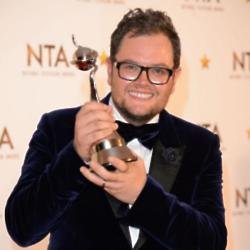 Alan Carr with his Chat Show Host prize at the National Television Awards