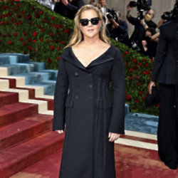 Amy Schumer wore a long-sleeved black dress for the Met Gala