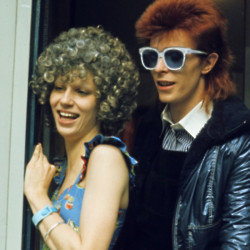 David Bowie told his Ziggy Stardust hair stylist his wife Angie wanted to hear about their fling moments before he bedded the hairdresser