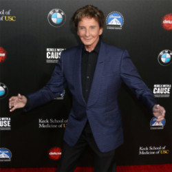 Barry Manilow's ex is happy he has found love again