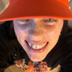 Billie Eilish has stunned fans by showing off diamond grills on her teeth