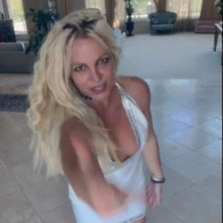 Britney Spears dances as she appears to celebrate being single