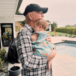 Bruce Willis has been pictured for the first time holding his new granddaughter