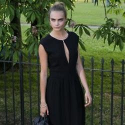 Cara Delevingne carries one of her Mulberry designs