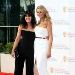 Claudia Winkleman and Tess Daly at the BAFTAs. Photo by: John Furniss / Corbis