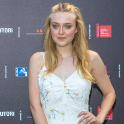Dakota Fanning wears a necklace with her late dog’s hair