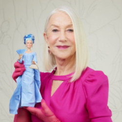 Dame Helen Mirren with her Barbie