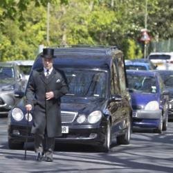 David Gest's hearse arrives at the funeral