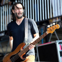 Keanu Reeves received bass guitar lessons from Flea