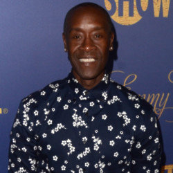 Don Cheadle would rather walk out of a screening than watch himself on screen