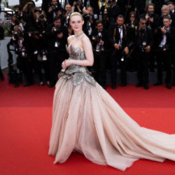 Elle Fanning has made her debut in an Alexander McQueen campaign to promote a new Joan of Arc-inspired range