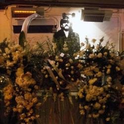 Floral tributes left to Lemmy at the nearby Rainbow Bar