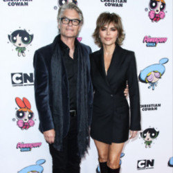 Harry Hamlin supports his wife's decision