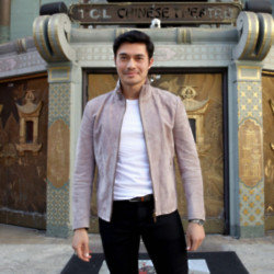Henry Golding doesn't think diversity should determine the identity of the next James Bond