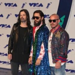 Jared Leto with his 30 Seconds To Mars bandmates
