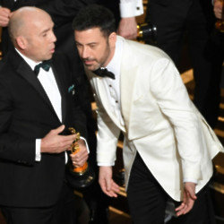 Jimmy Kimmel is fighting to lose weight by eating tiny tubs of food before he hosts this year’s Oscars as he thought he looked like a swollen sausage when he tried to squeeze into an old tuxedo