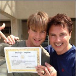 John Barrowman and Scott Gill with their marriage certificate