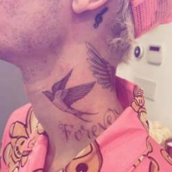Justin Bieber's neck tattoo (c) Instagram