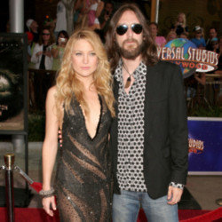 Kate Hudson has defended her decision to marry musician Chris Robinson when she was 21