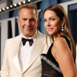 Kevin Costner and Christine Baumgartner have settled their divorce and the former model is said to be keen to move on with her life