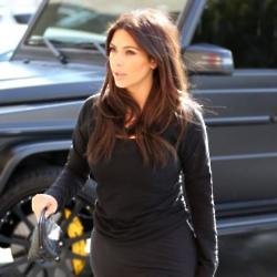Kim Kardashian looks chic as she heads to the gym