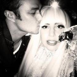 Lady Gaga and Taylor Kinney posing affectionately 