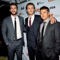 Liam Hemsworth with brothers Chris and Luke