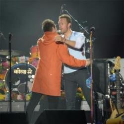 Liam Gallagher and Chris Martin 