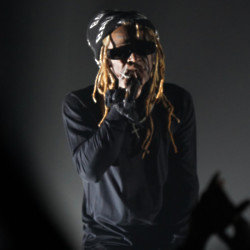 Lil Wayne's fans chanted his nickname for a while before the house lights came up