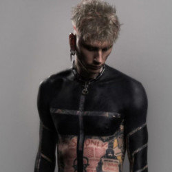 Machine Gun Kelly has used his latest song to admit his shock body blackout tattoo was sparked by a ‘breakdown’