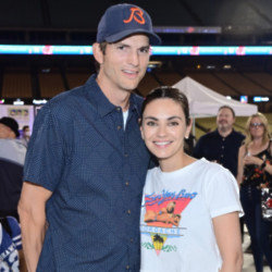 Mila Kunis says she and her husband Ashton Kutcher had no choice but to ‘power through’ his health scare
