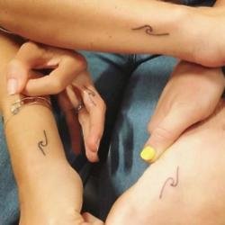 Miley and Elsa's matching tattoos. Lauren Winzer's Instagram
