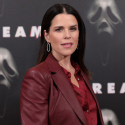 Neve Campbell adopted Raynor in 2018
