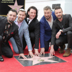 Lance Bass says there were lots of 'tears of joy' when NSYNC reunited in the studio
