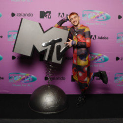 Olly Alexander posing at the MTV EMAs 2021