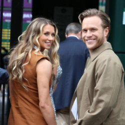 Olly Murs doesn't like wearing jewellery and is finding it hard to adjust to his wedding ring