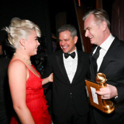 Oppenheimer's Christopher Nolan celebrates with stars Matt Damon and Florence Pugh