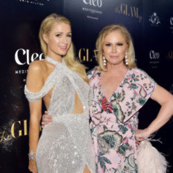 Kathy Hilton has been teaching Paris Hilton how to deal with the early stages of motherhood