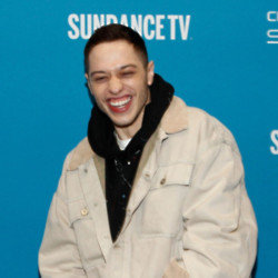 Pete Davidson seems to be enjoying the perks of being associated with the Kardashians, a source claims.