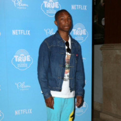 Pharrell dubs Jay-Z 'an odd guy'