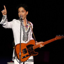 Prince wearing a Tony Burch tunic at Coachella 2008