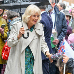 Queen Camilla braved the rain in Rye