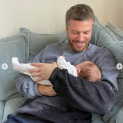 Rick Edwards enjoying a cuddle with his newborn son (c) Instagram