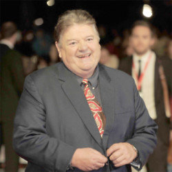 Robbie Coltrane’s son has wittily paid tribute to his late comedian dad by posting the message: ‘Just woke up what did I miss?’