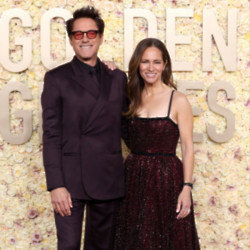 Robert Downey Jr and his wife at the Golden Globe Awards