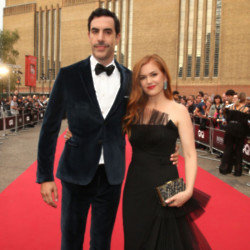 Isla Fisher says it was love at first sight when she met Sacha Baron Cohen