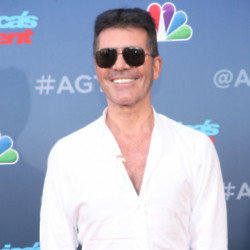 Simon Cowell is reportedly engaged to partner Lauren Silverman