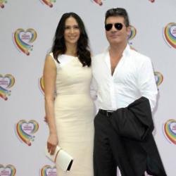 Simon Cowell and Lauren Silverman at The Health Lottery Tea Party