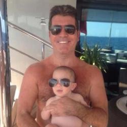 Simon Cowell and his son Eric (c) Twitter