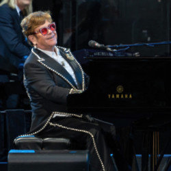 Sir  Elton John refuses to perform without his glasses